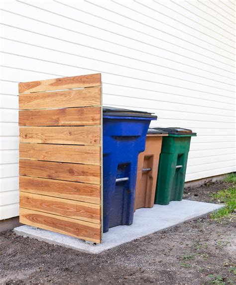 privacy fence for trash bins.